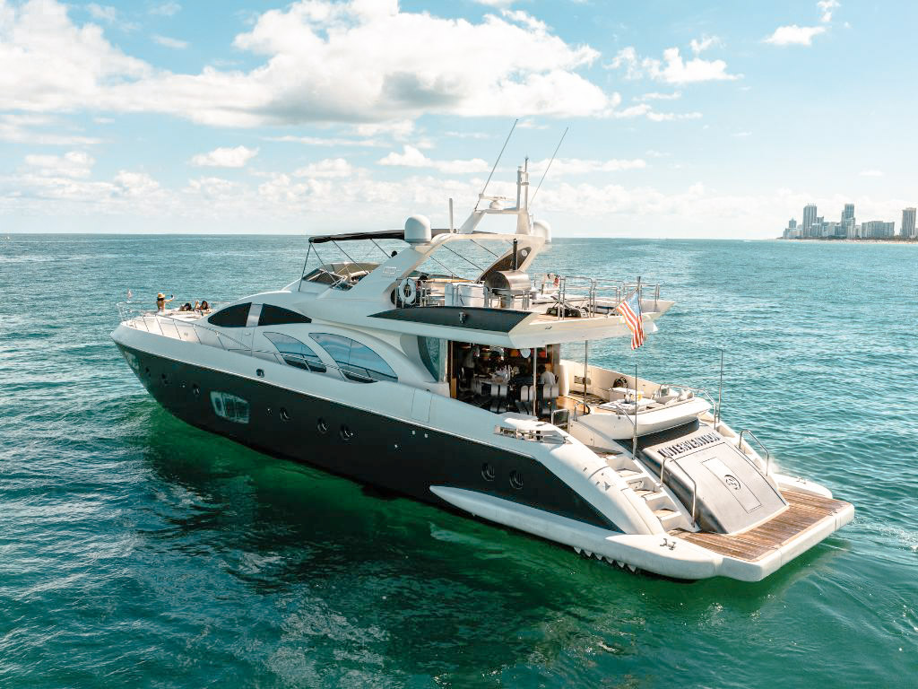 Luxurious 100ft Azimut yacht docked in Miami, ready for your private charter experience.