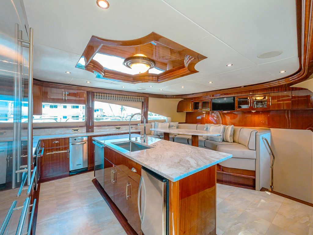 112 Lazarra yacht with guests enjoying the top deck hot tub