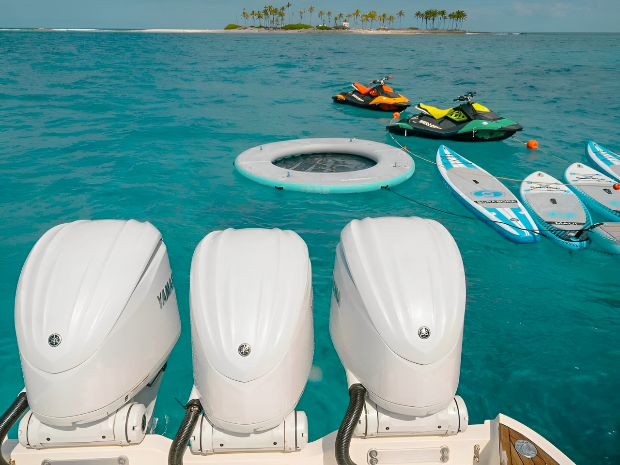 A guest relaxing on the sunpad of the 109 Mangusta yacht