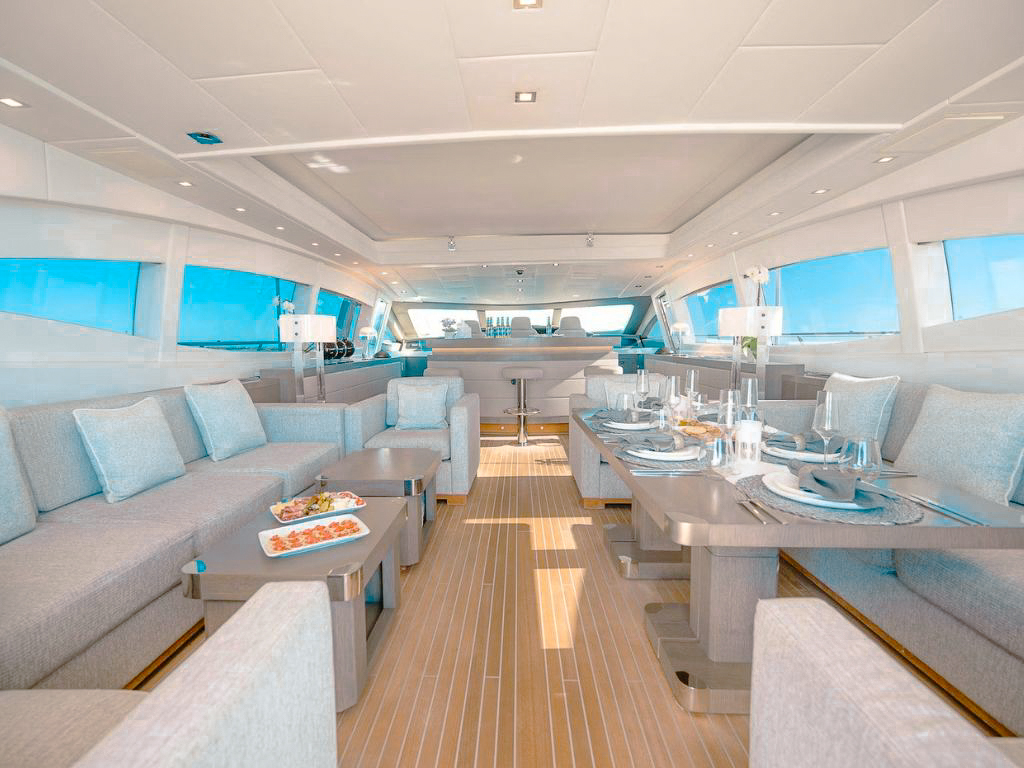 People enjoying water activities from the 109 Mangusta yacht