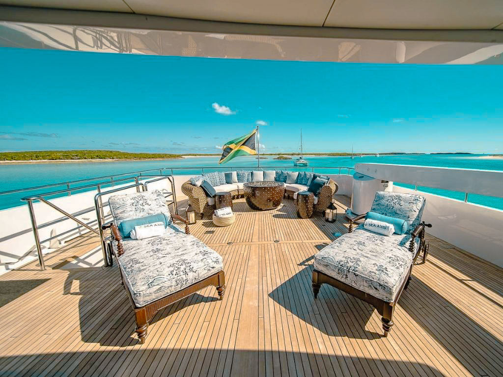 People enjoying activities on the back deck of 125 Heesen yacht_5