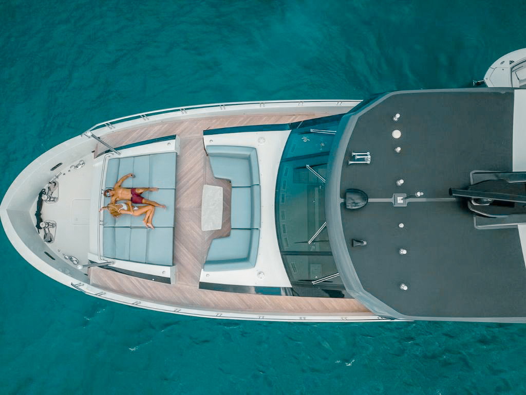 Rear view of 90 Ocean Alexander yacht with tender and ocean in background
