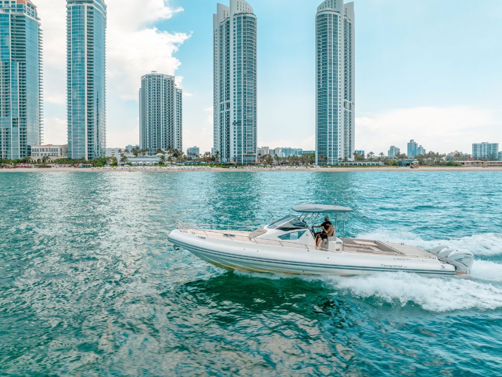 The sleek 44ft Capelli Miami yacht ready for your charter, offering a luxurious experience.