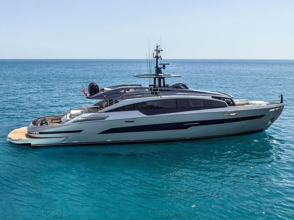 The luxurious 105 Azimut II yacht navigating the Miami waters for a top charter experience.