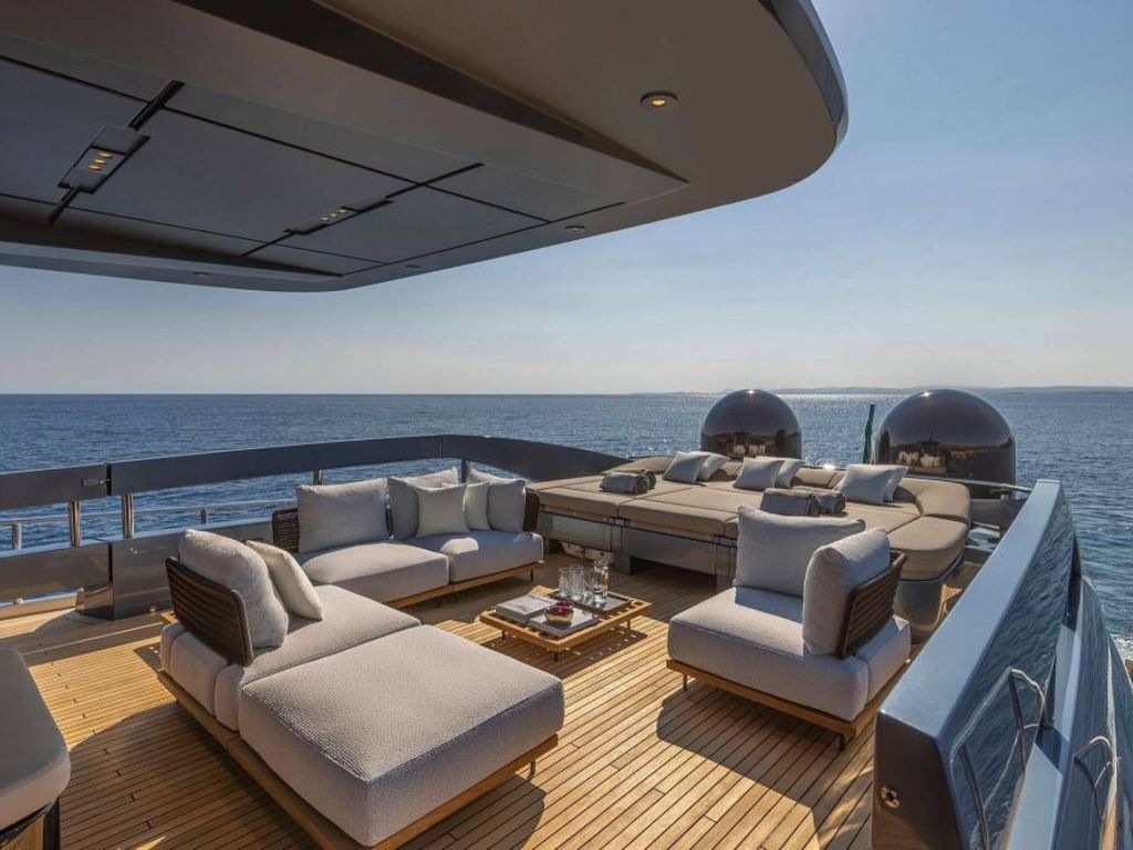 Aft deck of the 116 Pershing yacht with seating and jacuzzi