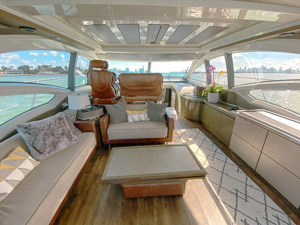 62 Azimut S yacht parked at sandbar with clear water