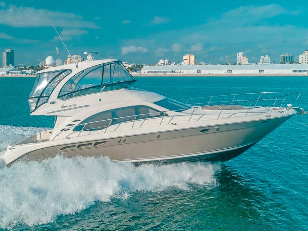 Aft deck of the 52 Sea Ray II yacht with seating and sunpads