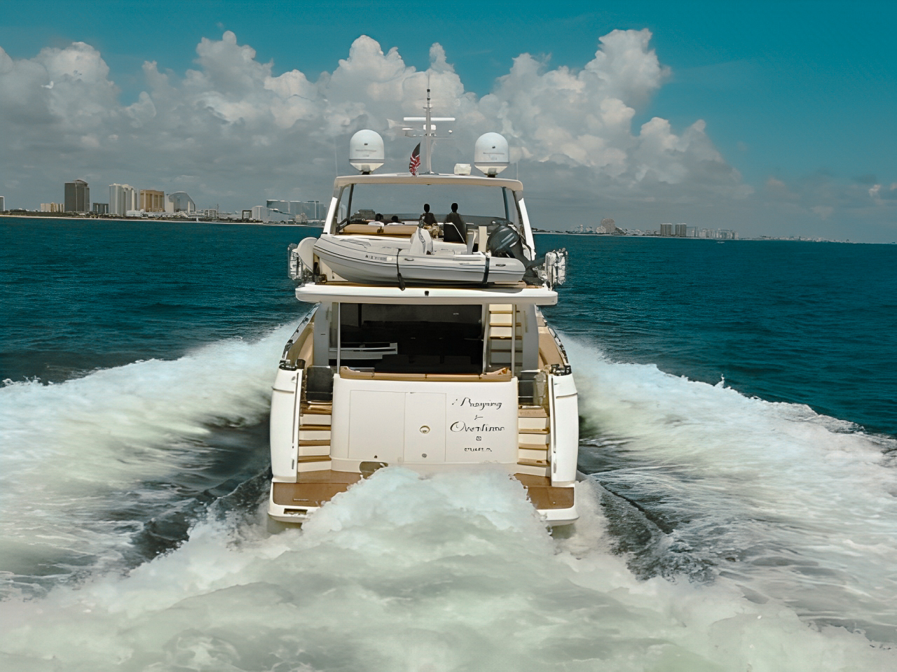 Luxurious 85ft Princess yacht available for charter cruising in the clear waters of Miami.