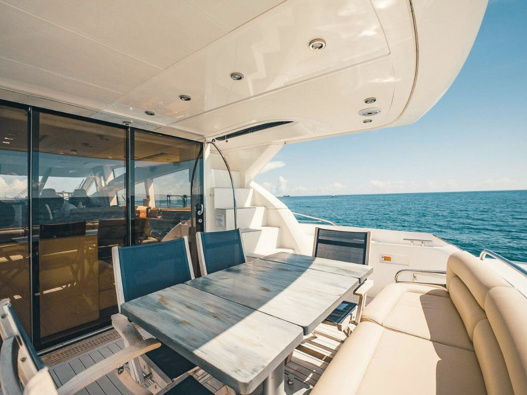 Aft deck seating area on 70 Sunseeker II yacht