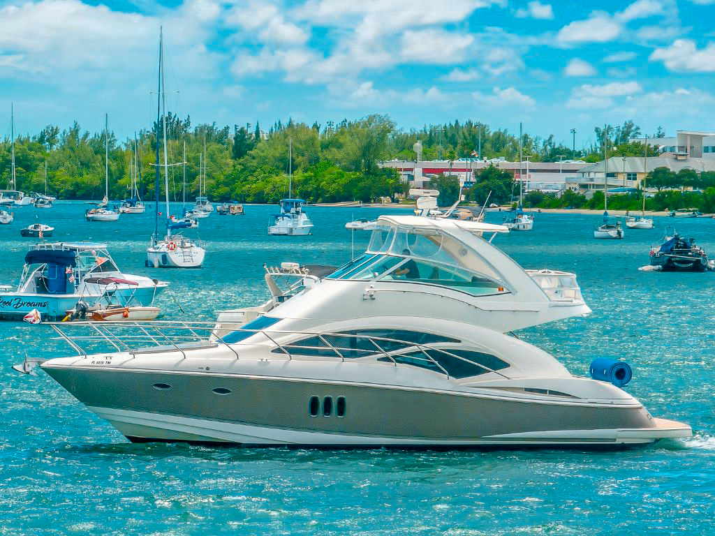Luxury 48ft Cruiser Sport yacht docked in Miami, ready for charter