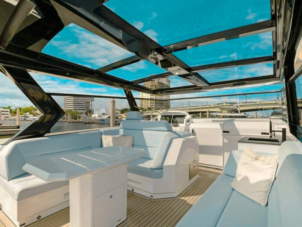 58 Vanquish IV yacht on the water with crew