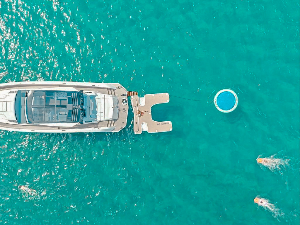The luxurious 58ft Vanquish IV yacht docked and ready for charter in Palm Beach, Florida.