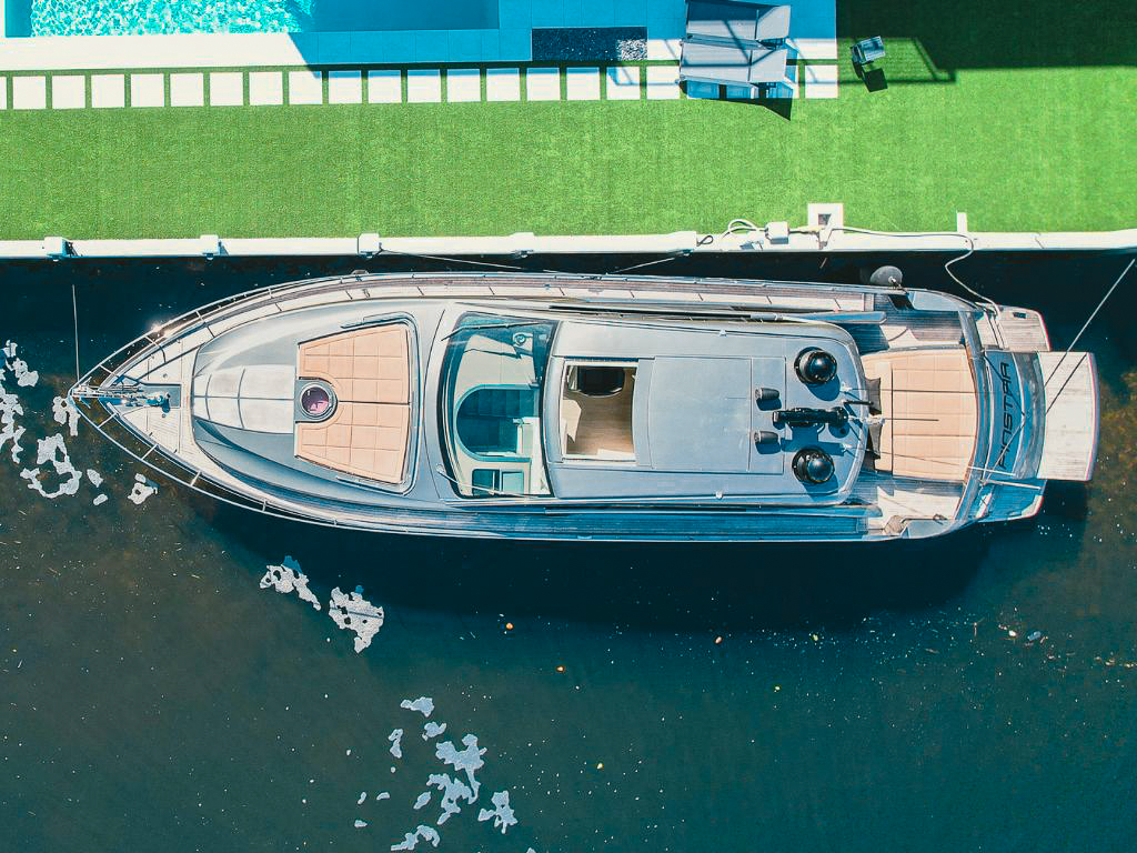 Spacious aft deck of the 62 Pershing with dining table