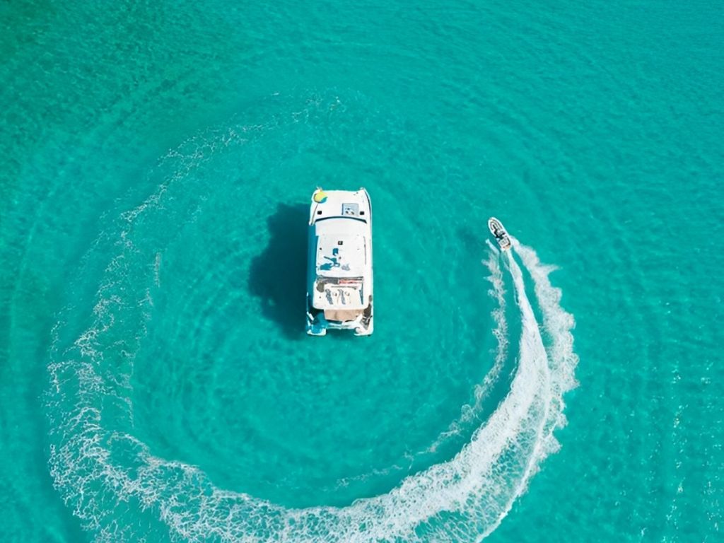 Bow of 60 Horizon yacht with seating and open water