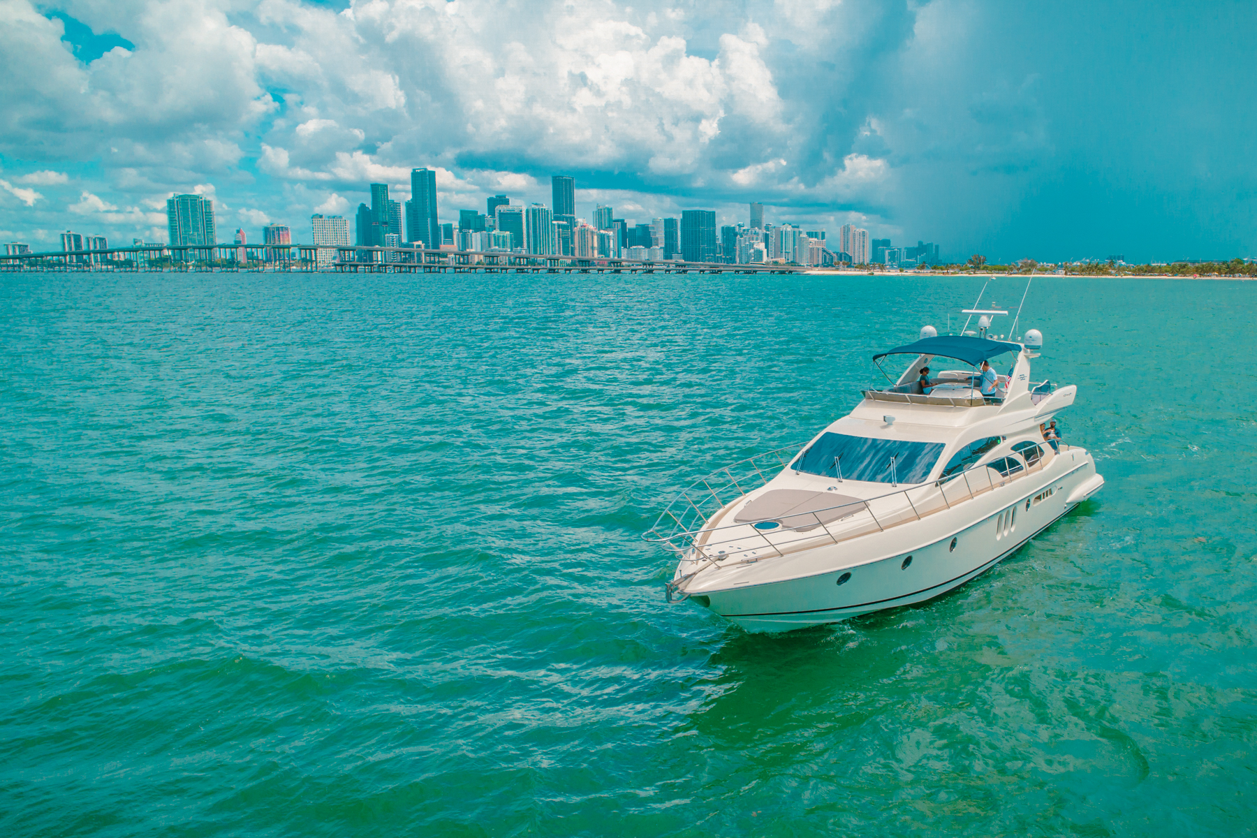 Luxury 62ft Azimut yacht docked in Miami, ready for private charter.