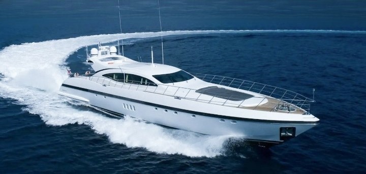 Stunning 109ft Mangusta yacht docked in Italy, ready for your charter aboard.