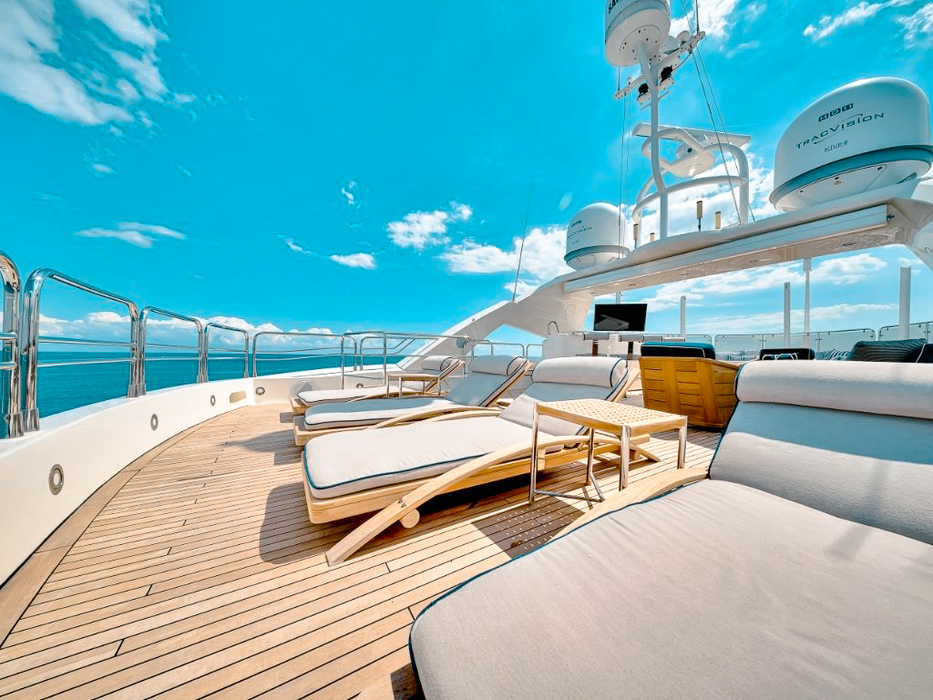 Guests relaxing on the deck of the 131 Sunseeker yacht