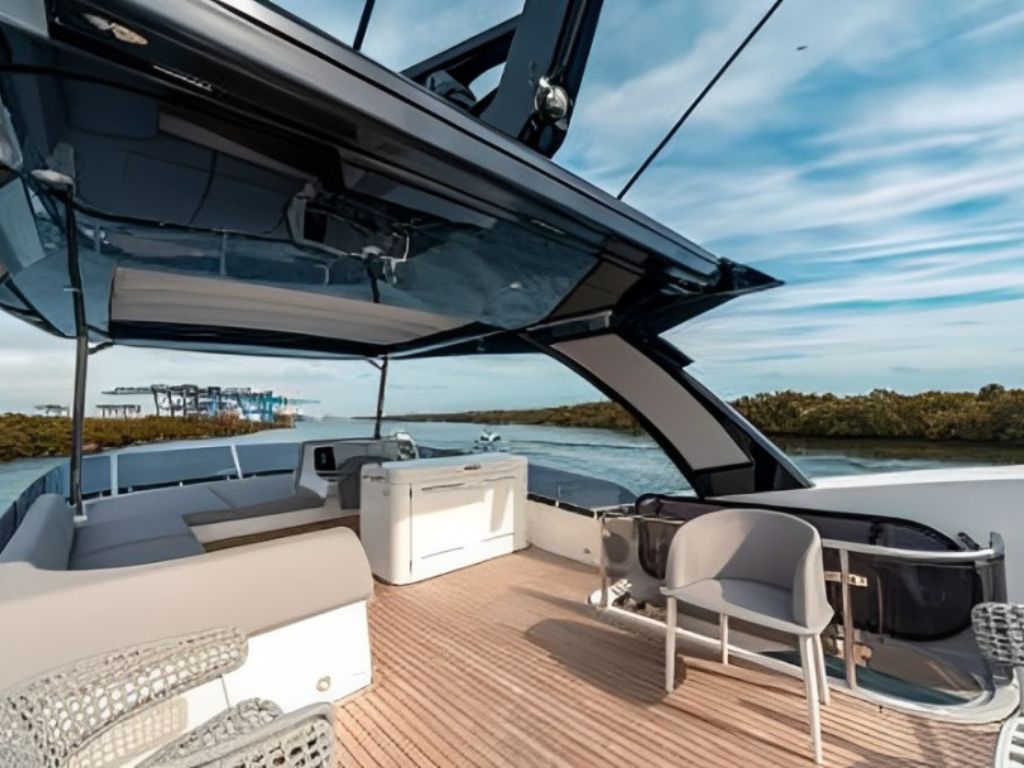 The back deck of the 68 Sunseeker yacht with comfortable seating overlooking the water