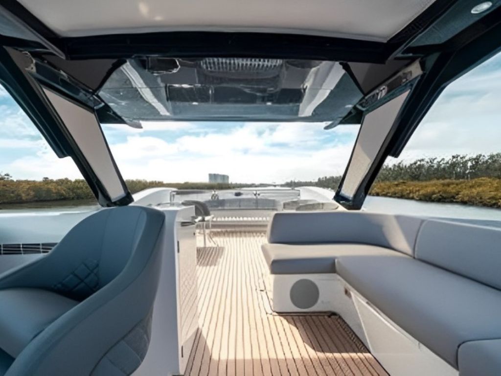 The front deck of the 68 Sunseeker yacht with sunpads for lounging
