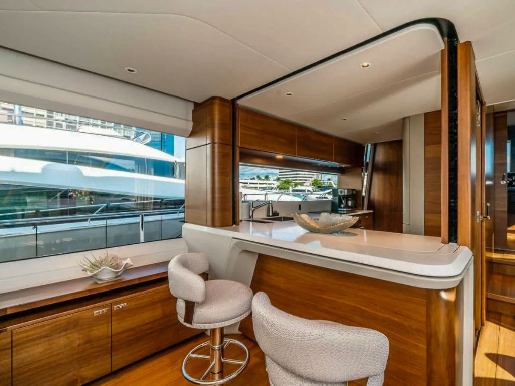 85 Princess yacht anchored in clear blue waters