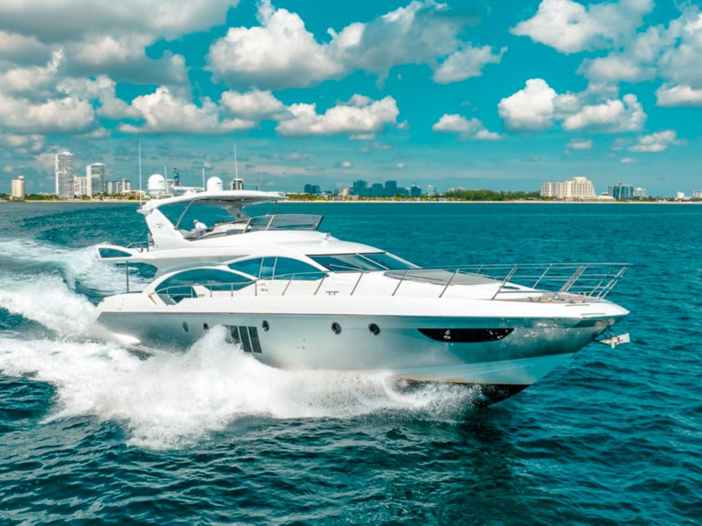 Luxury 68ft Azimut III yacht sailing the Miami coastline for a private charter experience.