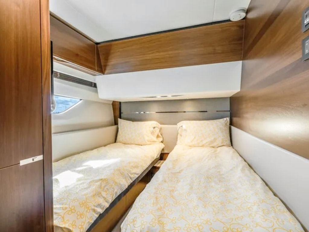 Guests enjoying the bow of the 65 Princess yacht