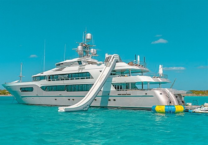 185 Delta motor yacht with beach club available for charter in The Bahamas