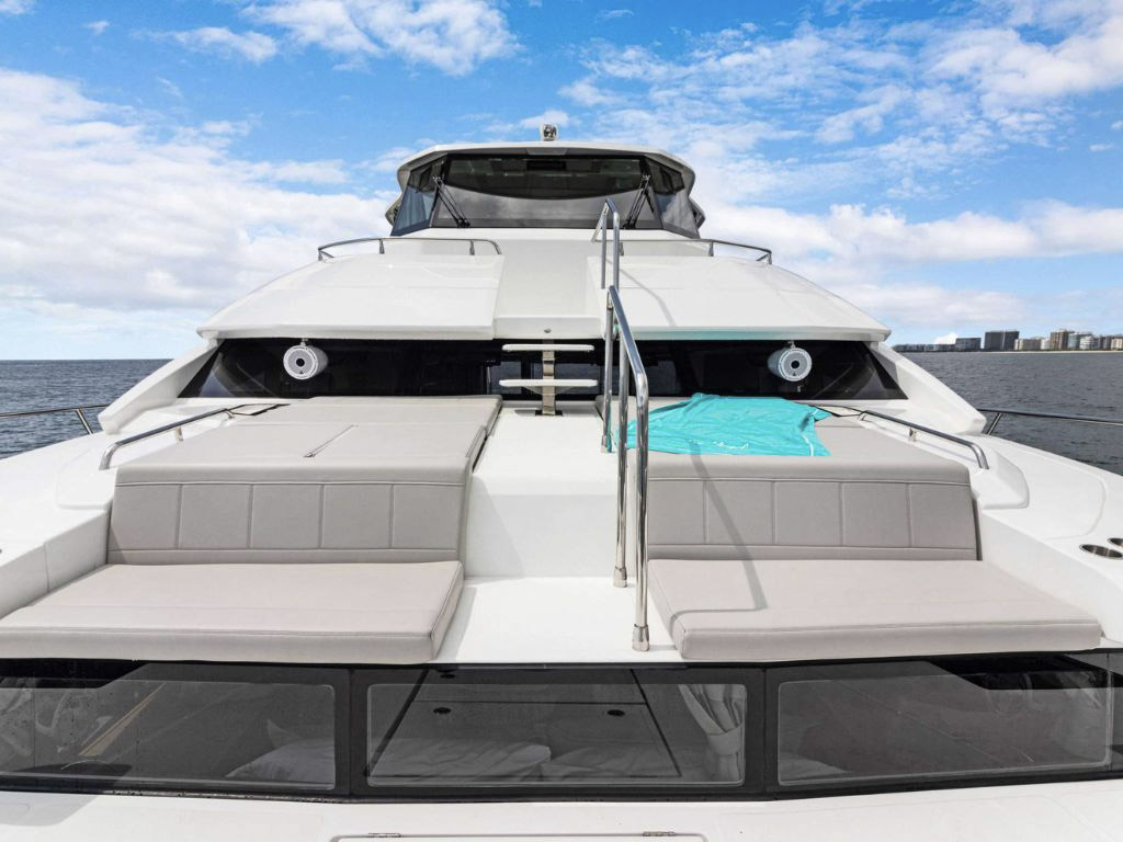 A guest enjoying a jet ski off the back of the 54 Aquila