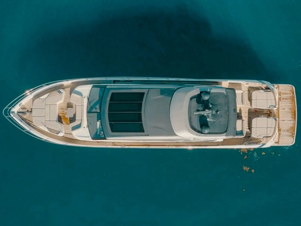 People on the bow of 78 Princess yacht