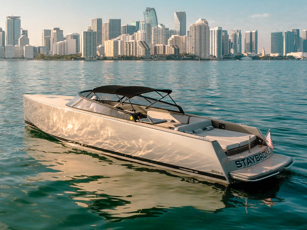 Side view of the sleek 40 Vandutch IV yacht on the water