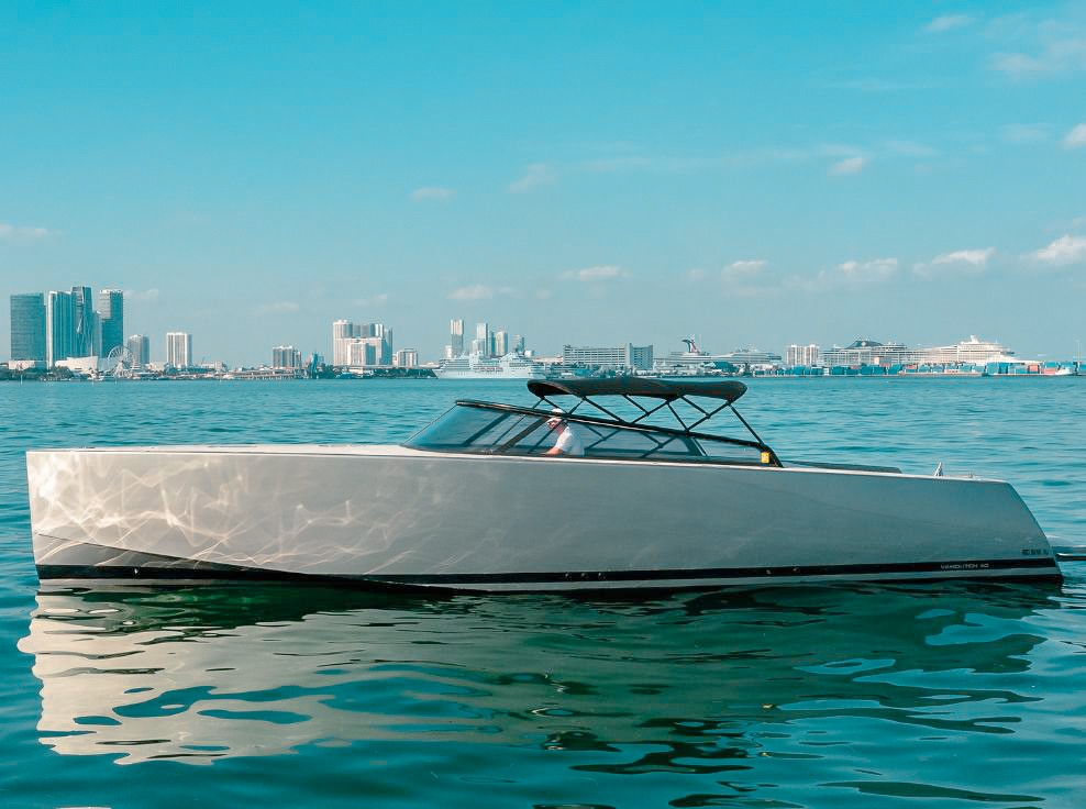 Luxury 40ft VanDutch IV yacht cruising in Miami waters, perfect for charters.