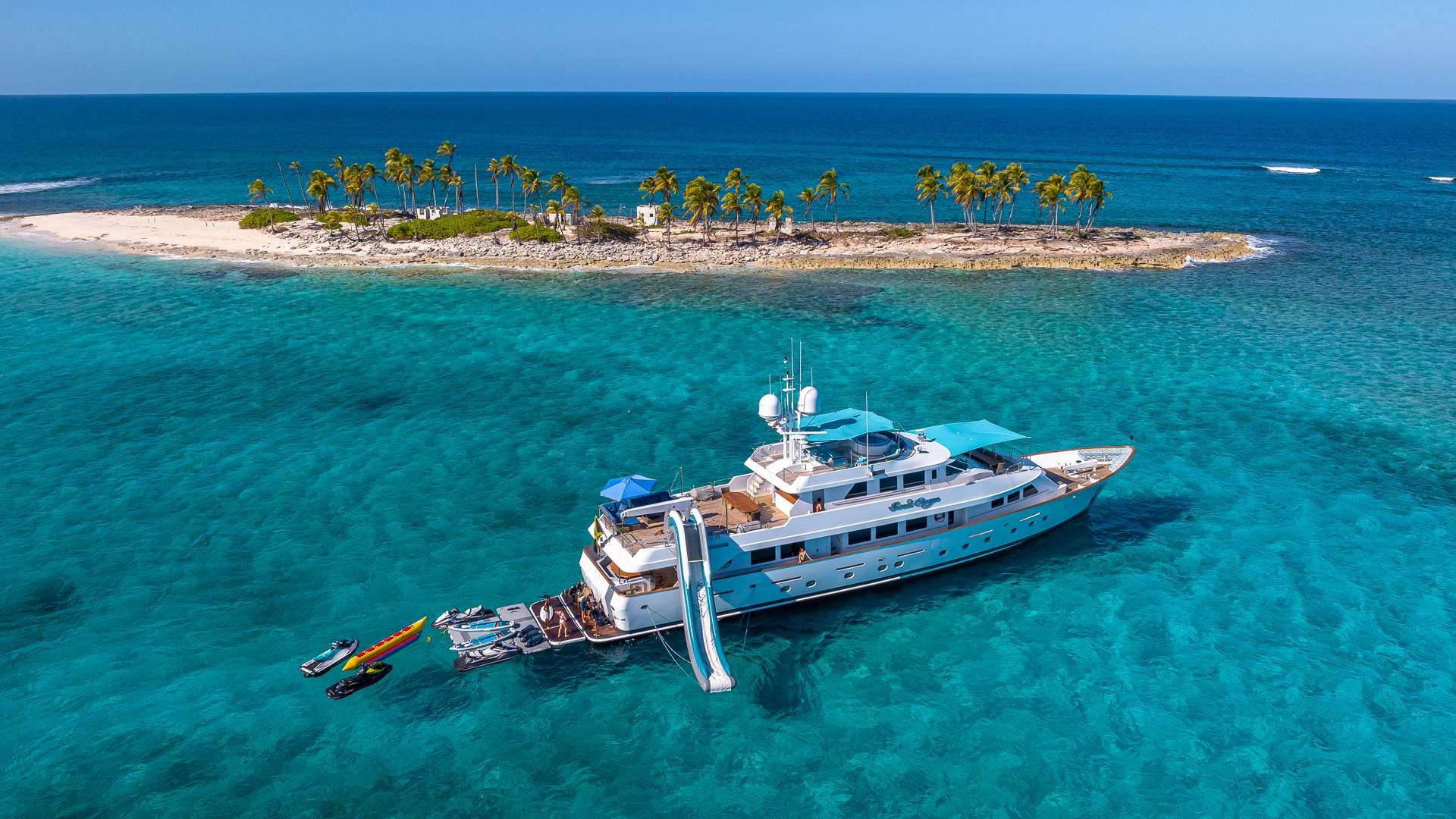 Luxury 130ft Christensen yacht charter cruising in the crystal clear waters of The Bahamas.