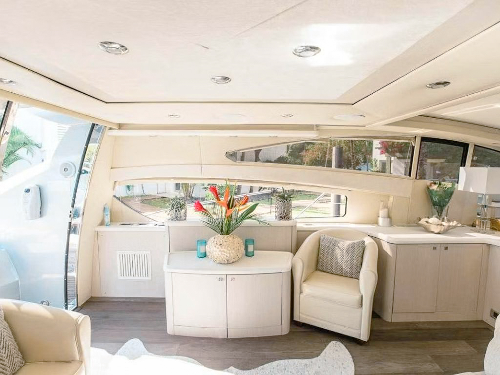 A couple enjoying the front deck of the 72 Sunseeker yacht