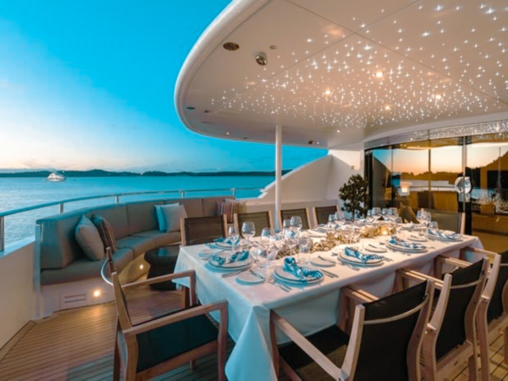 Dining area on the aft deck of the 144 Heesen yacht