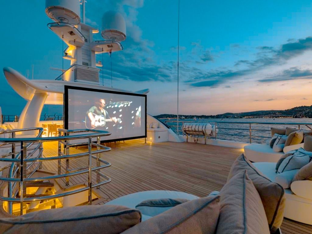 Spacious deck area with seating on the 180 Amels yacht