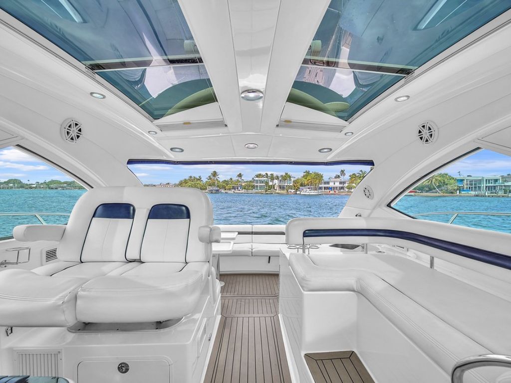 Group of people enjoying the front deck of the 47 Sea Ray yacht
