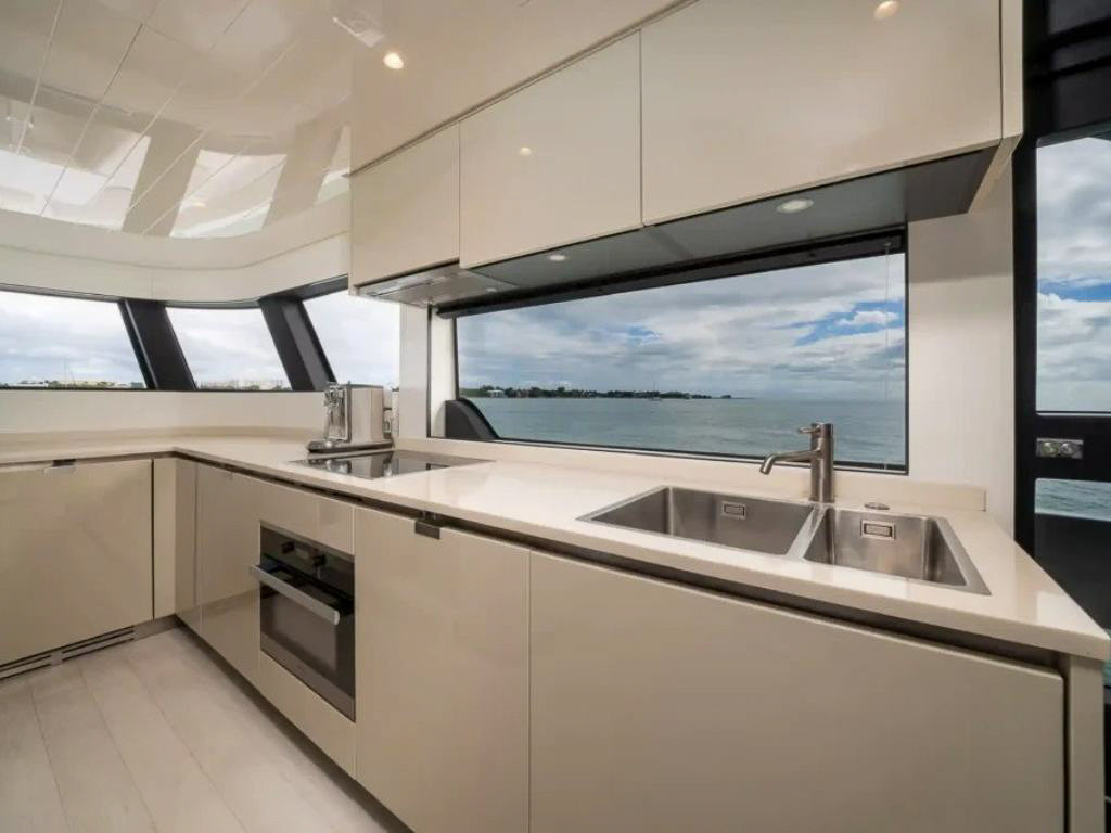 Stern view of the 72 Bluegame yacht with tenders and water access