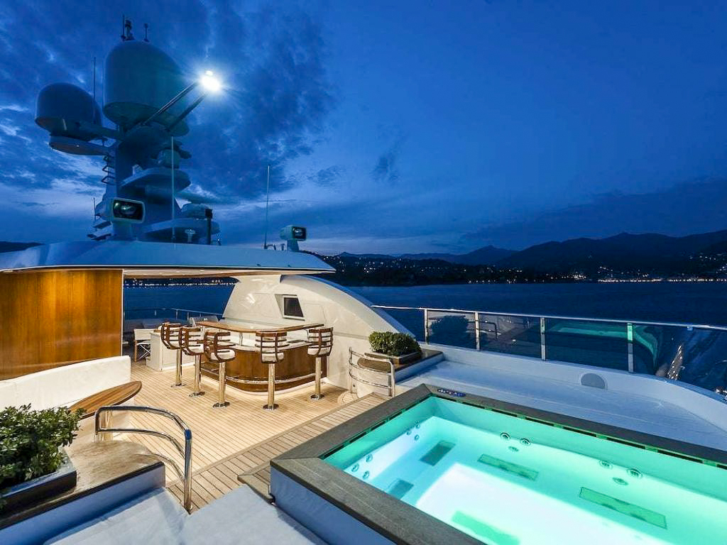 Dining and seating area on the deck of the 147ft TBA 147 yacht