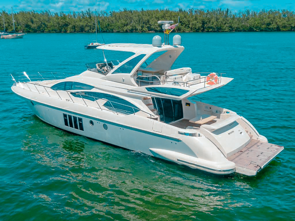 Exterior view of the 64 Azimut Fly yacht at anchor with sun out