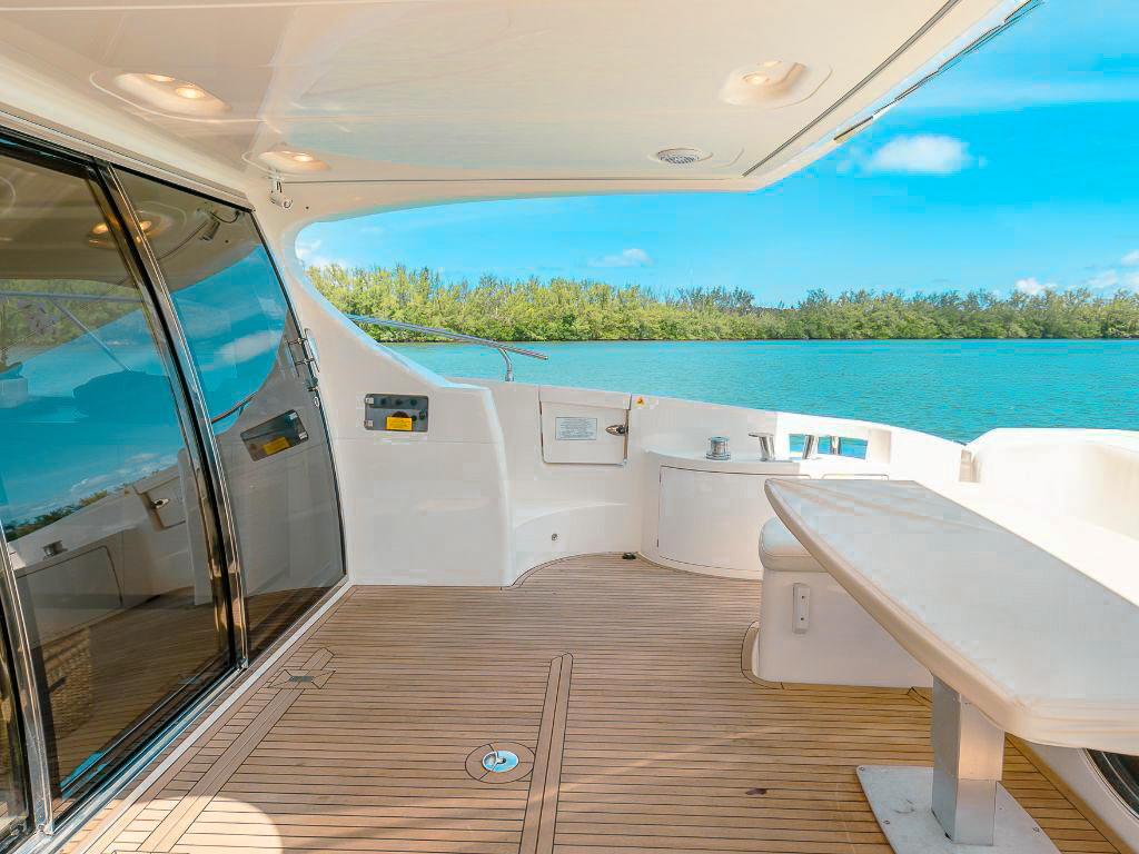 A luxurious Sirena 88 yacht charter vessel sailing on clear blue waters in 2026