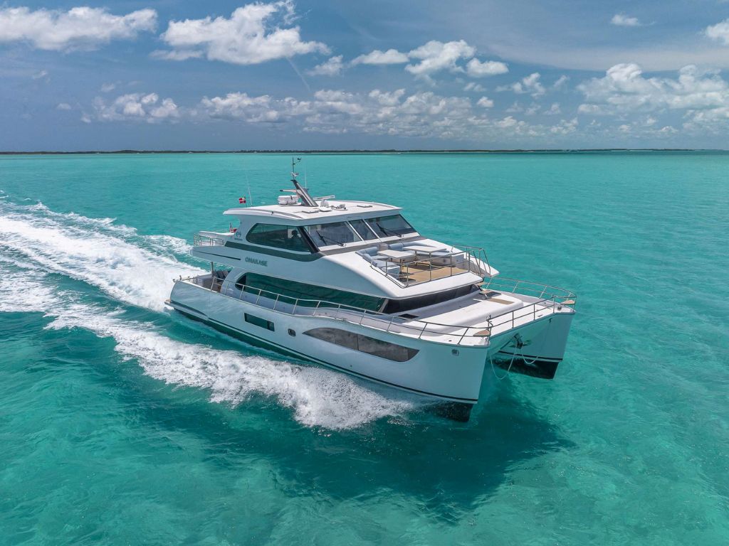 Luxury 68ft Horizon yacht cruising crystal clear waters in the beautiful Bahamas
