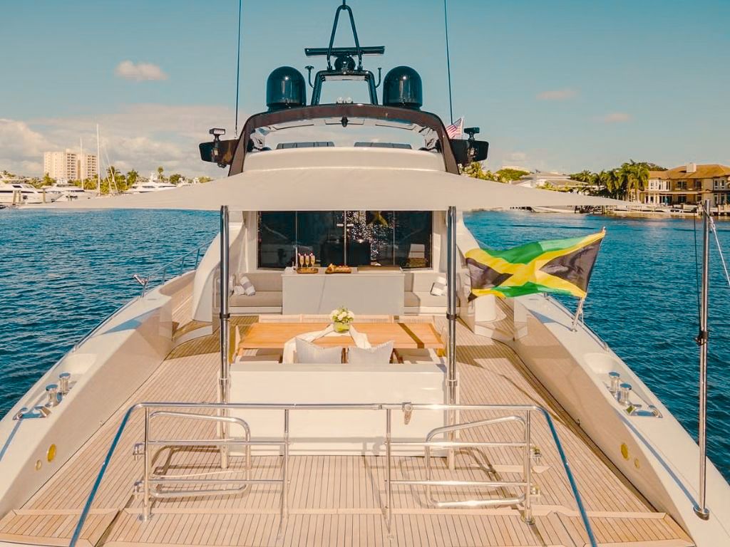 105ft Mangusta yacht sailing in the turquoise waters of The Bahamas.