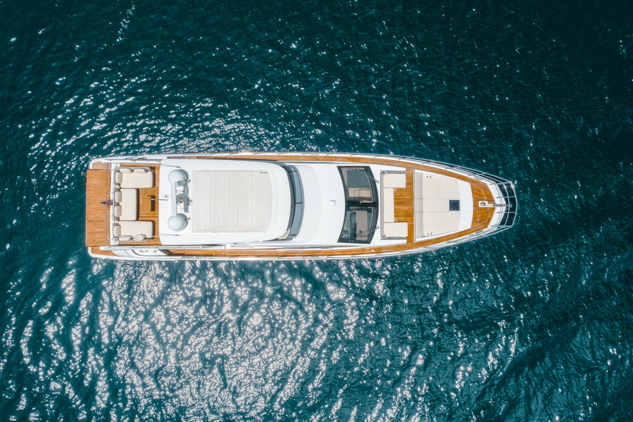 Bow seating area of the 70 Azimut Fly with ocean in background