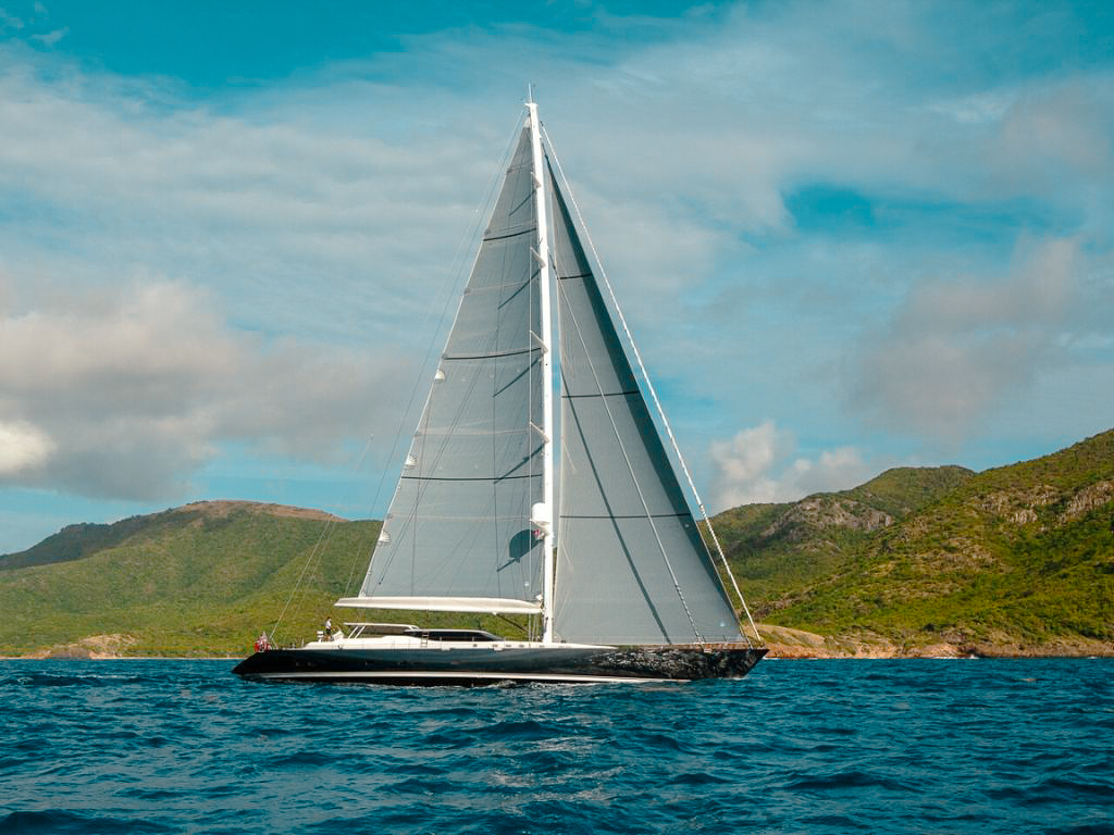 Side view of 131 Custom Sail yacht on the water