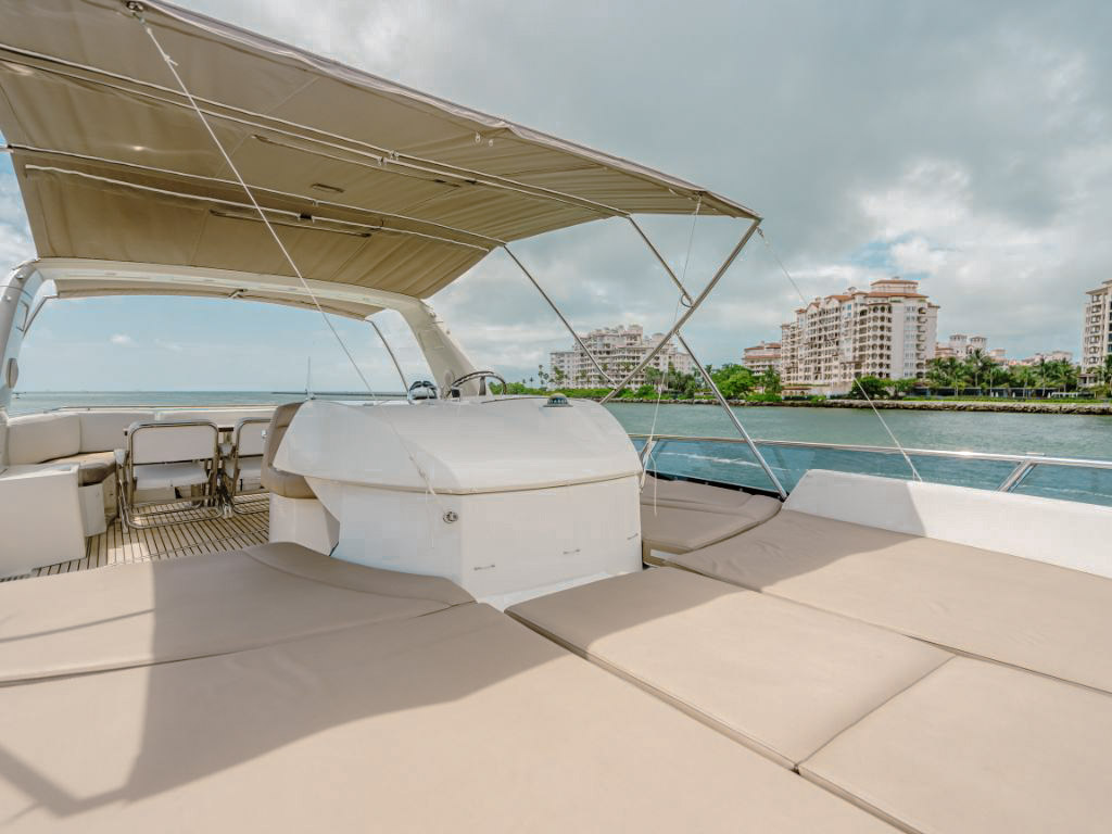 Aft deck of the Prestige 62 yacht with dining area