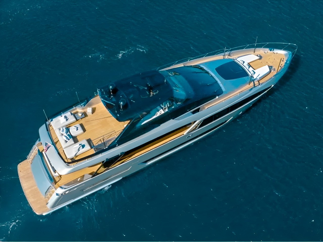Another exterior view of the 93 Riva yacht with its sleek design