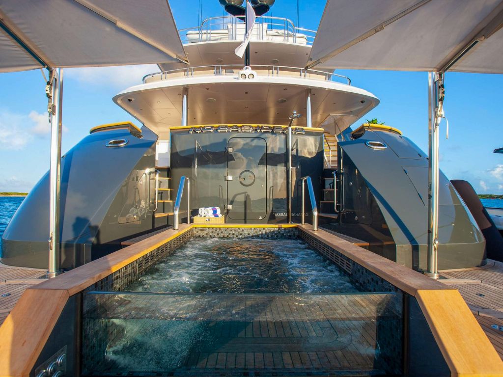 People relaxing on the deck of a yacht in The Bahamas