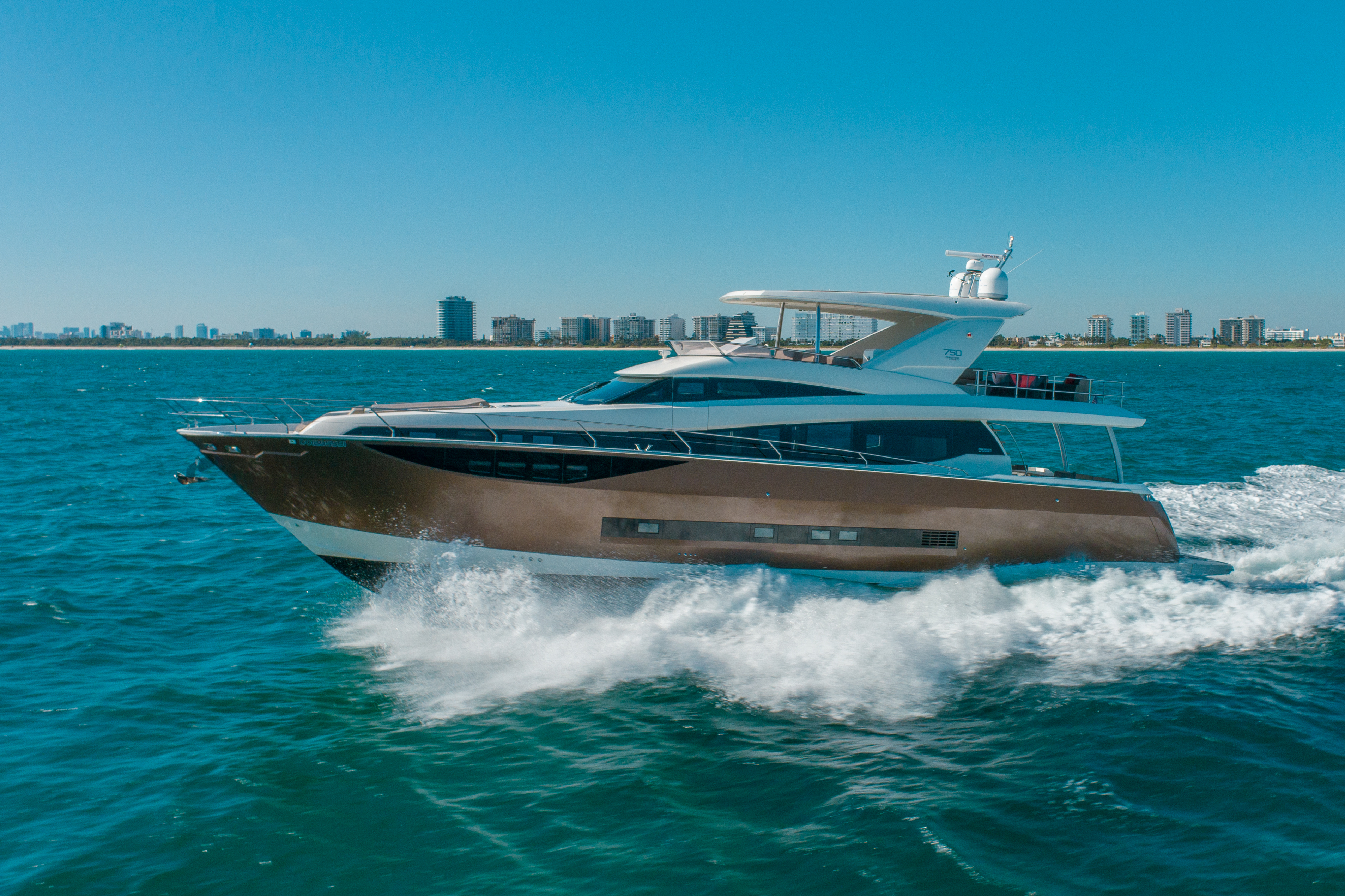 Back of 75 Prestige yacht with swimming platform open