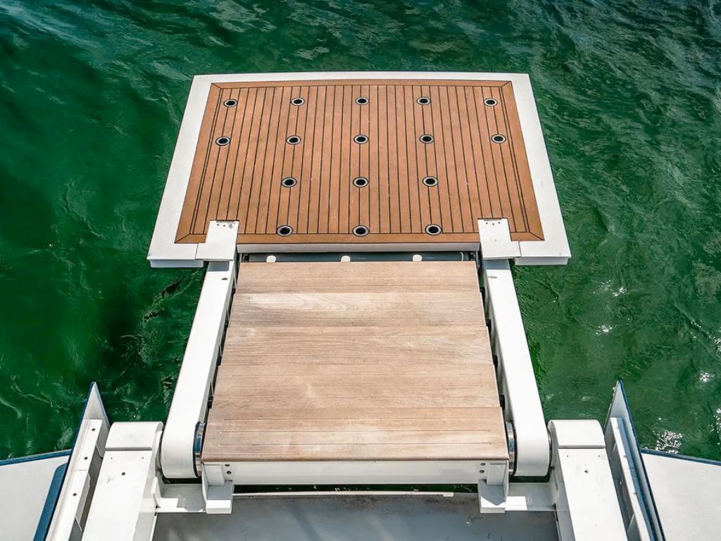 125 Broward yacht deck at sunset