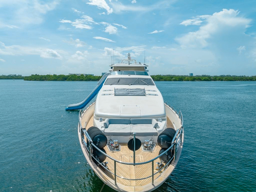 The luxurious 116ft Azimut private yacht docked in Miami, ready for charter.